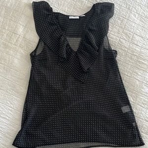 Women’s black polka dot sleeveless blouse